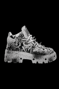 black and white spiked japanese shoes